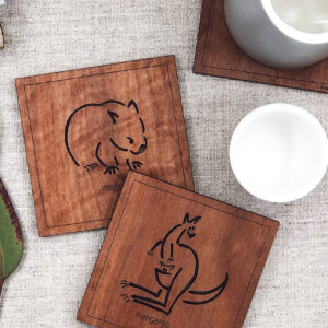 Set of six wooden square coasters and their recycled cardboard presentation box. Each coaster is a different animal. They are Emu, Koala, Wombat, Platypus, Kangaroo and Possum